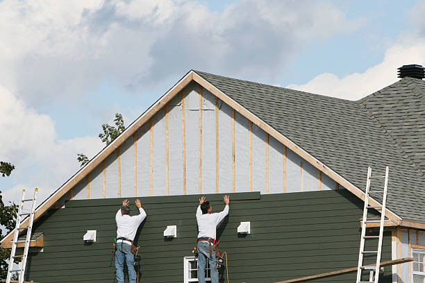 Professional Vinyl Siding technician working in Central City, PA